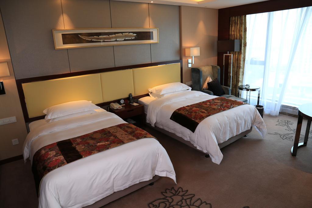 Guangzhou Changfeng Gloria Plaza Hotel Quarto foto