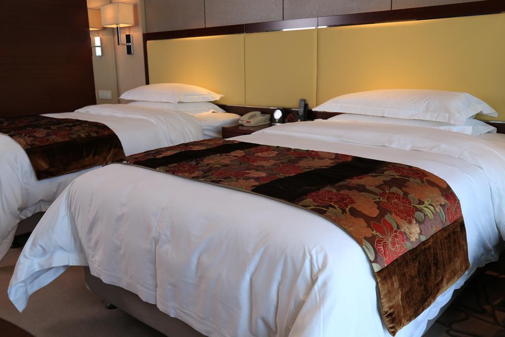 Guangzhou Changfeng Gloria Plaza Hotel Quarto foto